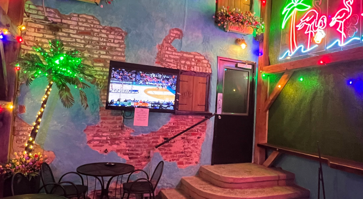 The back room at Jitters with sports on the screen